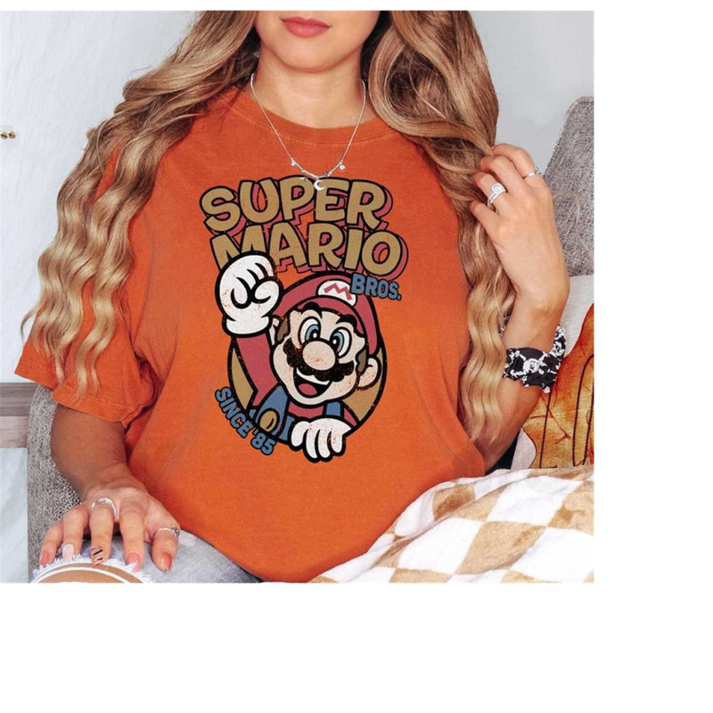 MR-18102023184745-classic-super-mario-bros-graphic-tee-vintage-85-retro-gaming-nostalgia-shirt-nintendo-80s-inspired-fashion-unique-super-mario-fan.jpg