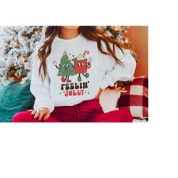 feelin jolly retro christmas crewneck sweatshirt holiday apparel christmas sweater groovy christmas shirt cute christmas
