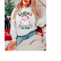 santa's favorite er crew christmas crewneck sweatshirt, retro santa er nurse christmas sweater, emergency department chr
