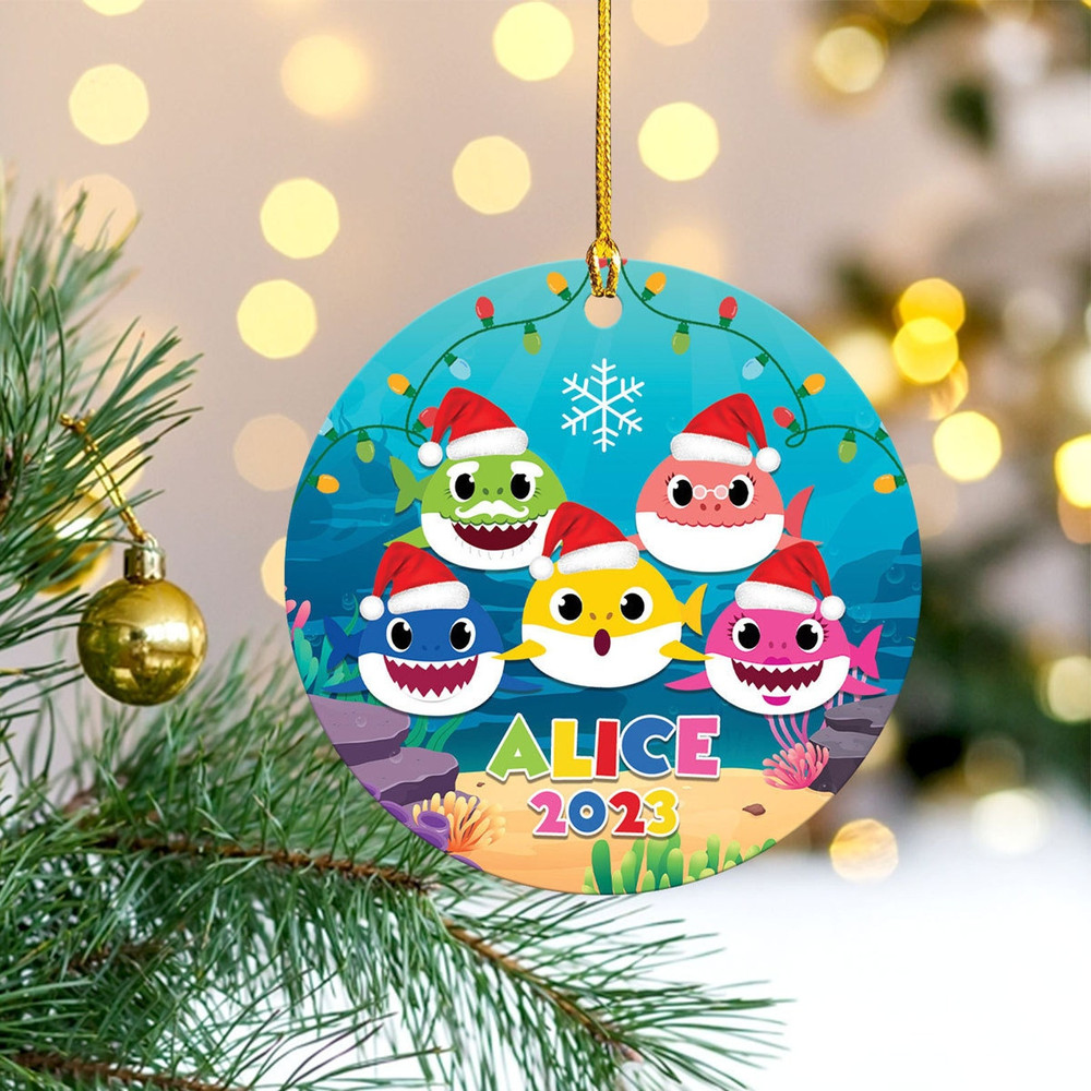 Christmas ornament that is personalized with a baby shark, as well as a gift ornament that is personalized with a baby shark - 1.jpg