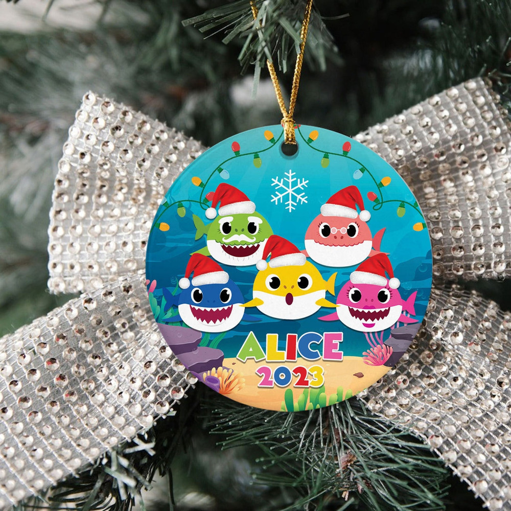 Christmas ornament that is personalized with a baby shark, as well as a gift ornament that is personalized with a baby shark - 2.jpg