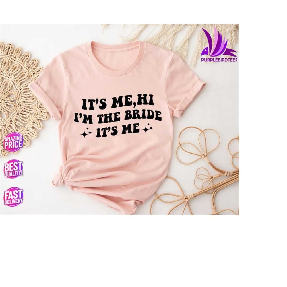MR-20102023145518-bride-shirt-funny-bride-shirt-engagement-gift-retro-groovy-bride-shirt-funny-bride-gift-its-me-hi-im-the-bride-its-me-bride-tee.jpg