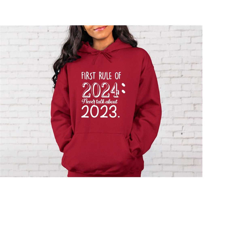 MR-23102023101538-first-rule-of-2024-never-talk-about-2023-hoodie-christmas-image-1.jpg