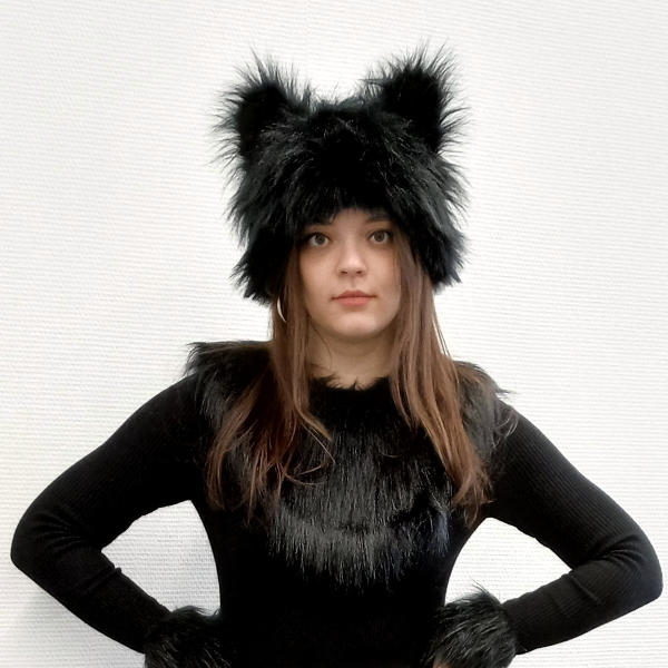 A hat with ears and a mane made of faux fur. Costume of a wolf, cat, lioness, panther, husky for a festival, cosplay.