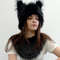 The mane of faux fur is gray, black and beige. Wolf, cat, lioness, panther, husky costume for the festival, cosplay.