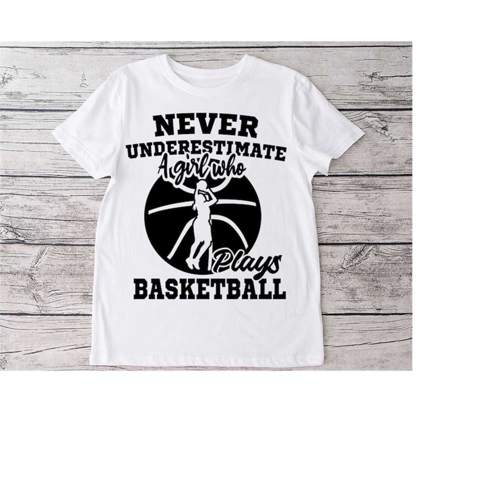 23102023182217-never-underestimate-a-girl-who-plays-basketball-themes-svg-image-1.jpg