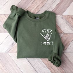 cute stay spooky sweatshirt, skeleton hand sweatshirt, womens spooky halloween sweatshirt, trendy halloween shirt, skull