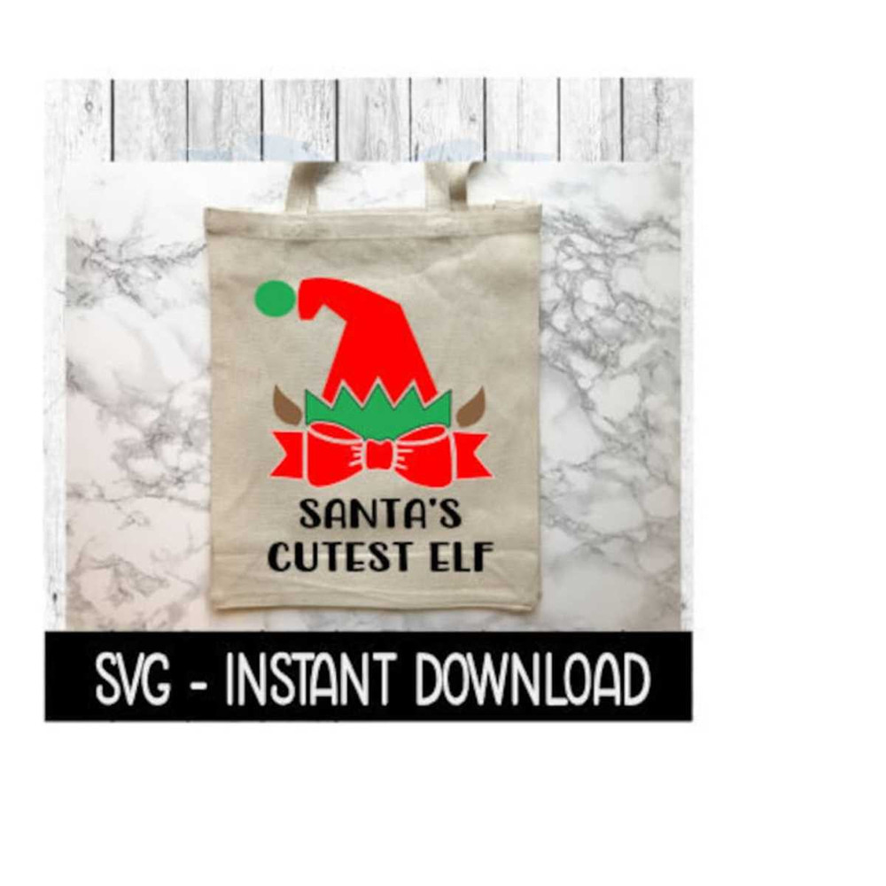 2510202392913-christmas-elf-svg-santas-cutest-elf-christmas-tote-bag-image-1.jpg