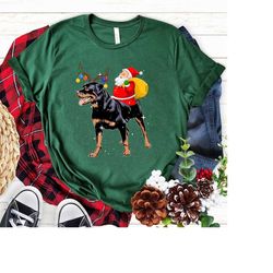 christmas santa riding rottweiler t shirt, christmas rottweiler ,rottie mom shirt, dog christmas shirt,rottweiler t-shir