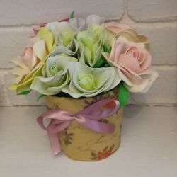 Beautiful composition of roses and eustomes in delicate colors. Handmade
