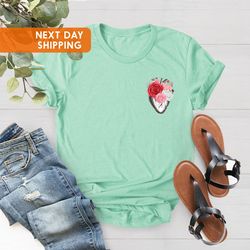 pocket heart shirt png, flower heart shirt png, floral heart womens shirt png, floral human heart t-shirt png, heart t-s