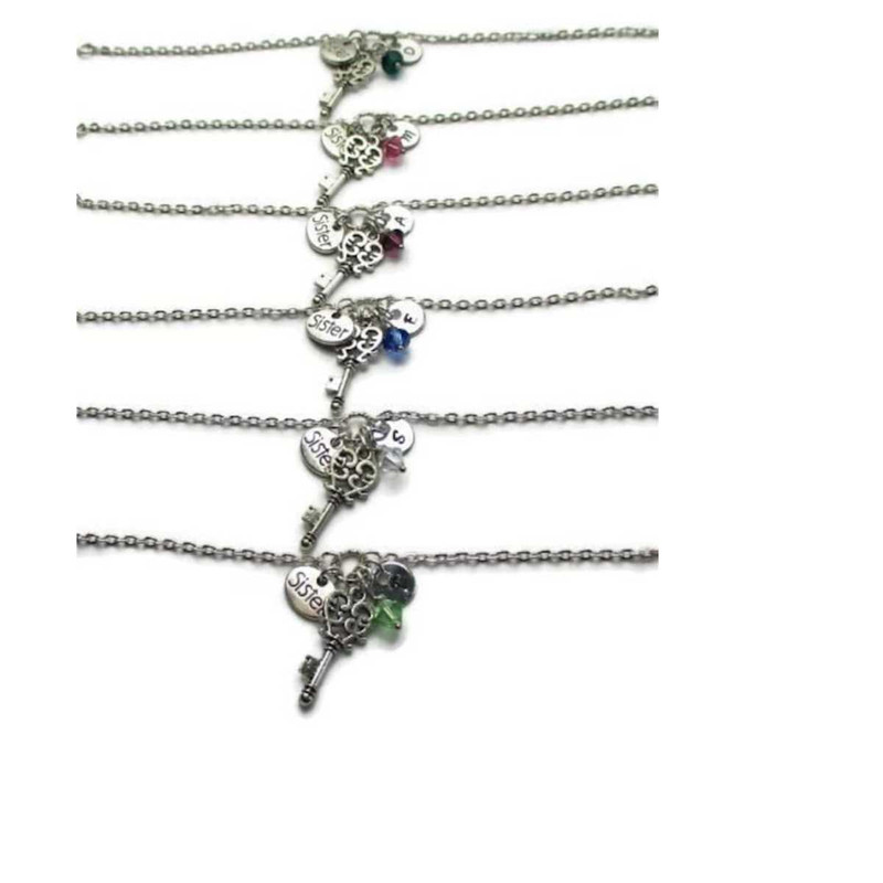 MR-26102023104210-6-sisters-key-bracelets-personalized-with-initials-and-image-1.jpg