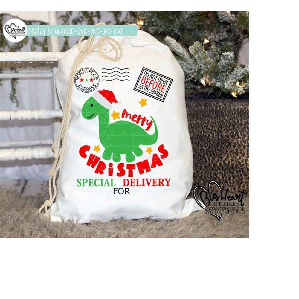 2610202311264-dinosaur-santa-sack-svg-png-jpg-dxf-design-cute-dino-santa-image-1.jpg