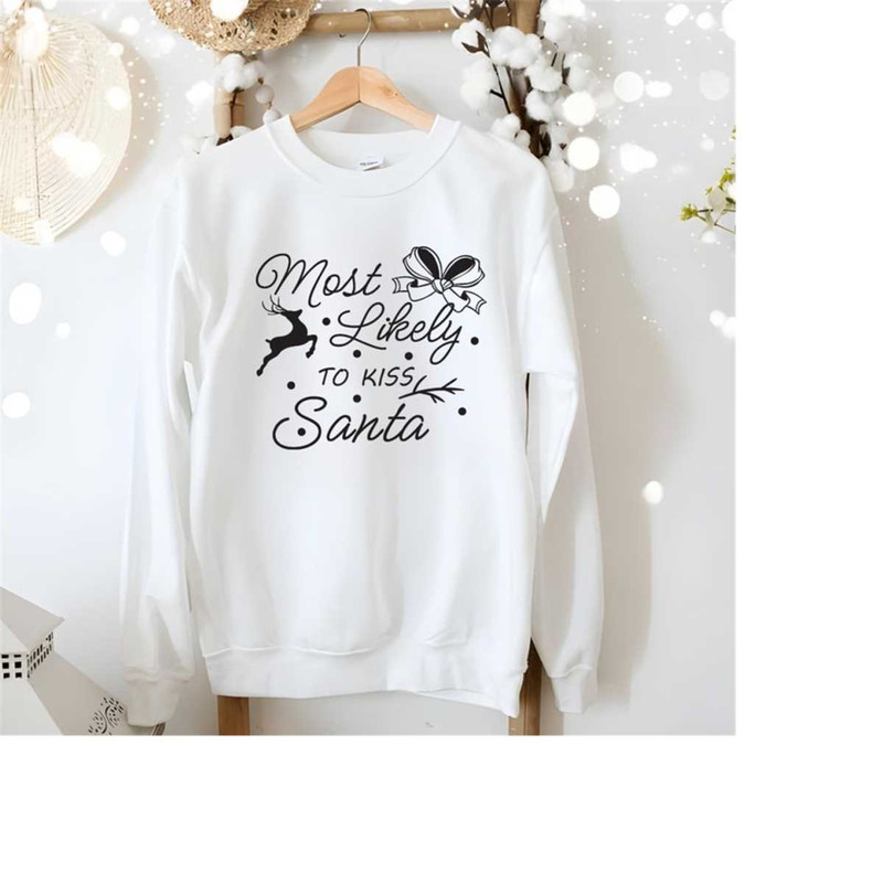 26102023143644-most-likely-to-kiss-santa-svg-png-cozy-vibes-svg-funny-image-1.jpg