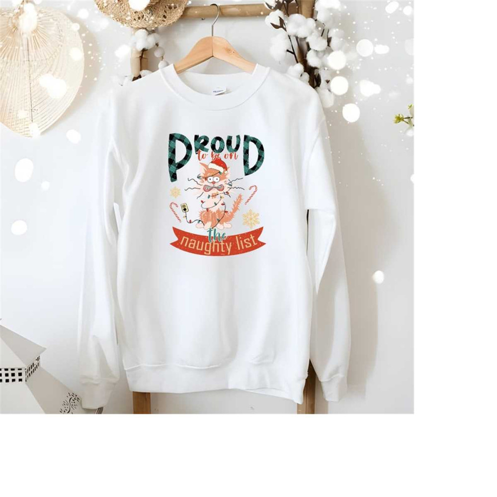 2610202314424-proud-to-be-on-the-naughty-list-png-funny-christmas-png-image-1.jpg