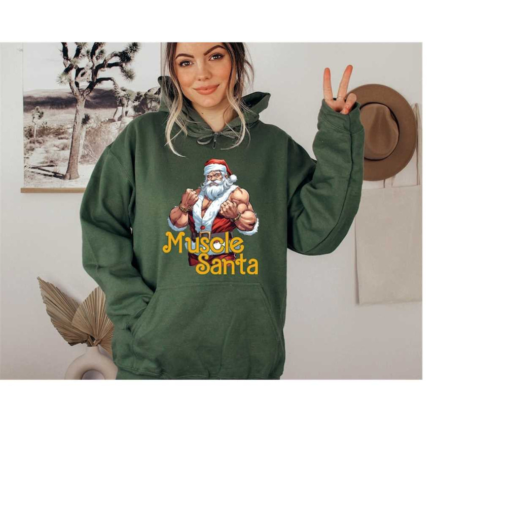 MR-26102023175838-muscle-santa-sweatshirt-christmas-gym-hoodie-santa-claus-image-1.jpg