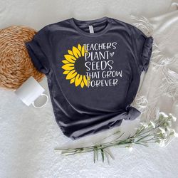 plant teacher tee, gifts for back to school, teachers plant seeds that grow forever tshirt png,sunflower teacher shirt p