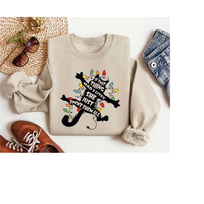 MR-2810202392344-if-that-thing-had-9-lives-she-just-spent-them-all-sweatshirt-image-1.jpg