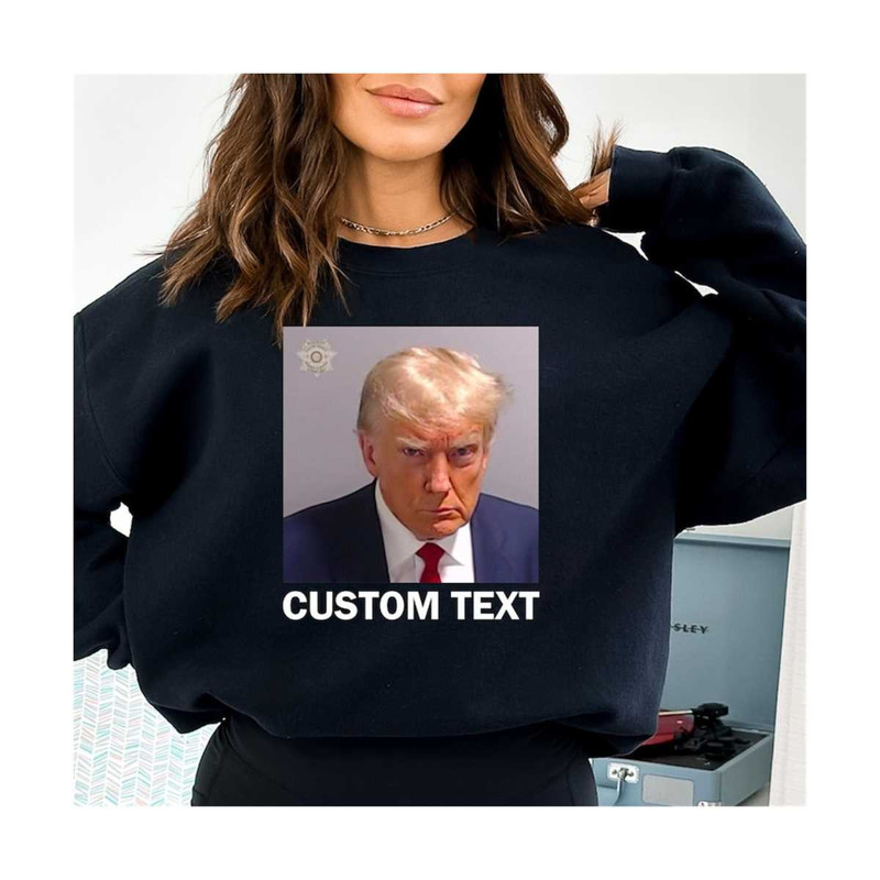 MR-3010202314522-custom-mugshot-sweatshirt-donald-trump-mug-shot-2023-image-1.jpg