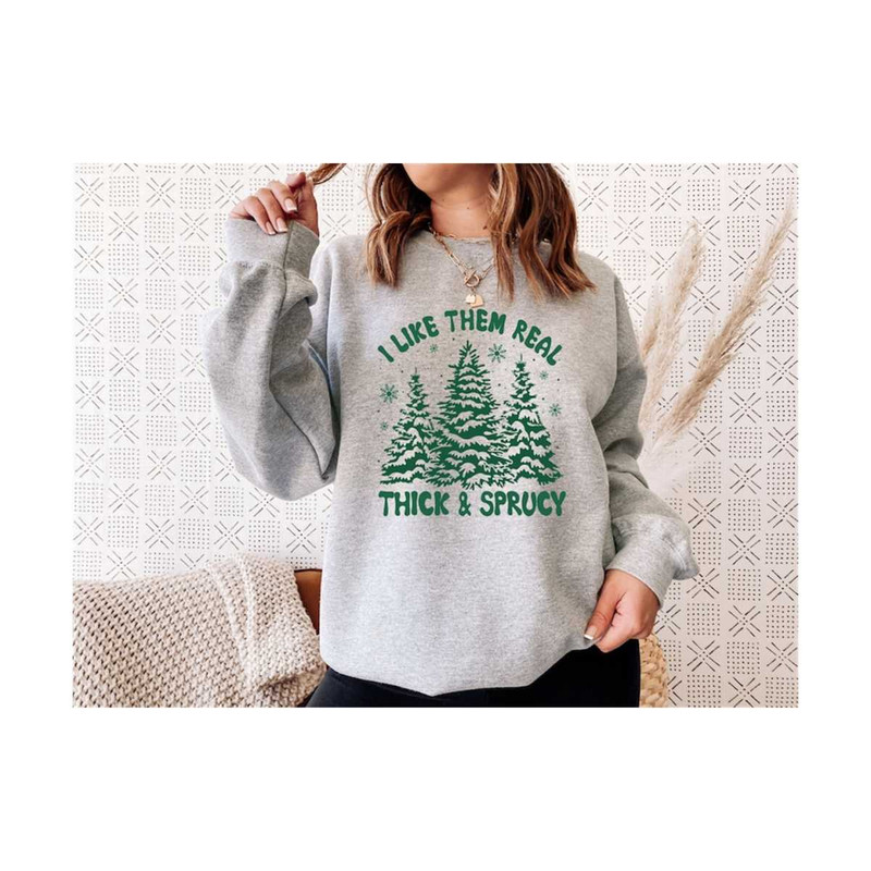 MR-30102023164212-i-like-them-real-thick-and-sprucy-sweatshirt-funny-christmas-image-1.jpg