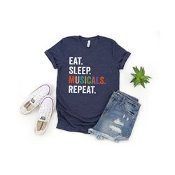 eat sleep musicals repeat t-shirt, music shirt, music teacher shirt, band shirt, music therapy shirt, teacher shirt, musician shirt