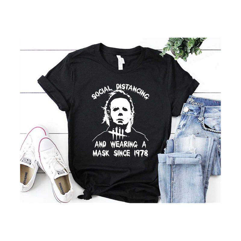 31102023112947-michael-myers-shirt-social-distancing-and-wearing-a-mask-in-image-1.jpg