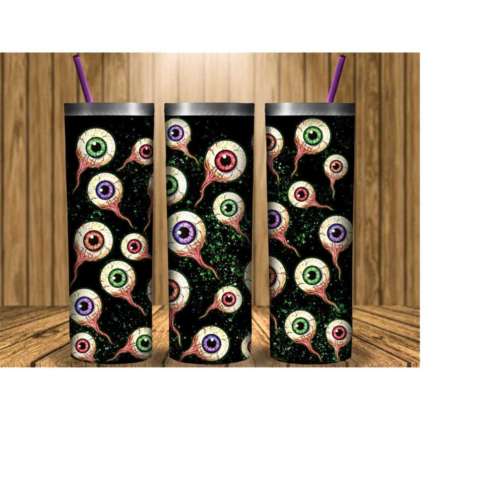 11120239199-halloween-spooky-eyes-tumbler-png-20oz-skinny-tumbler-image-1.jpg