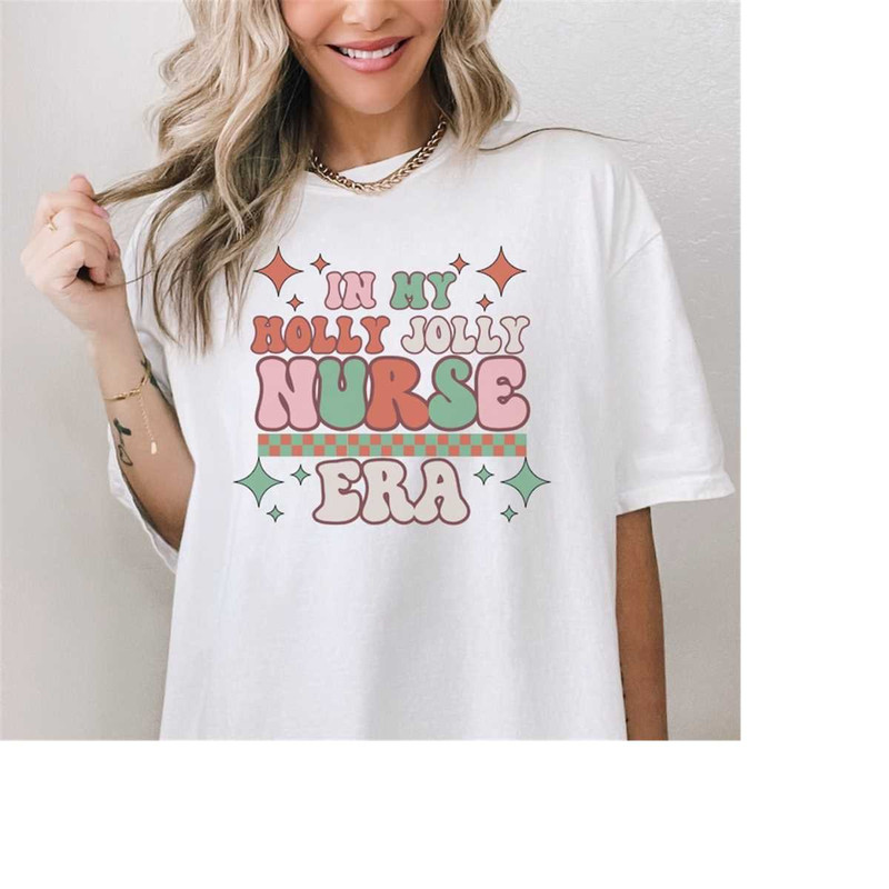 MR-1112023134921-christmas-nurse-in-my-nurse-era-shirt-nurse-christmas-svg-image-1.jpg