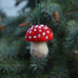 Christmas tree toy fly agaric. Christmas tree ornament. Felted mushroom