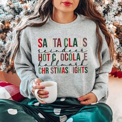 santa claus hot chocolate sweatshirt, hot chocolate shirt, christmas light shirt, tis the season christmas shirt, funny