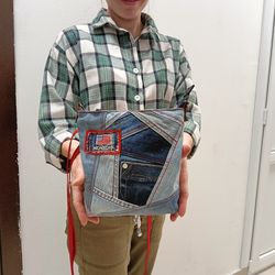 small denim crossbody or shoulder bag, handmade in crazy patchwork style from environmentally friendly jeans material