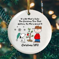 its not what is under the christmas tree that matters whos around it snoopy peanuts ornament