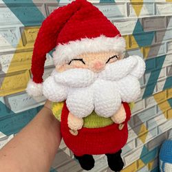 Handmade Santa Claus toy, perfect gift for Christmas and New Year.
