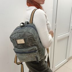 Nice backpack handmade from used denim material dark gray color with zip pocket