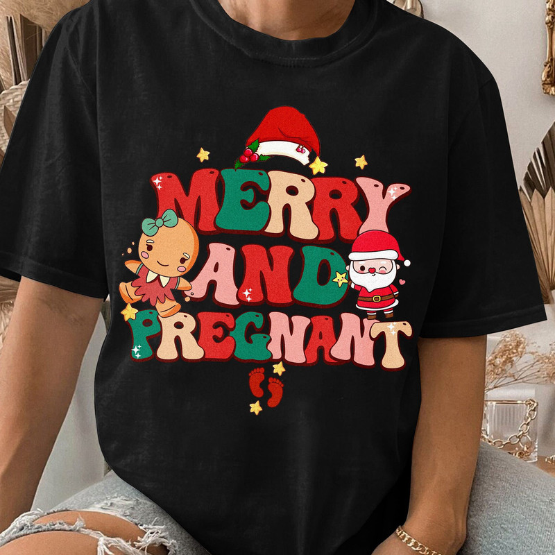 Merry and Pregnant Shirt, Funny Pregnancy Reveal Shirt, Christmas Pregnancy Announcement, Baby Reveal Gift Unisex T Shirt Sweatshirt Hoodie 3.jpg