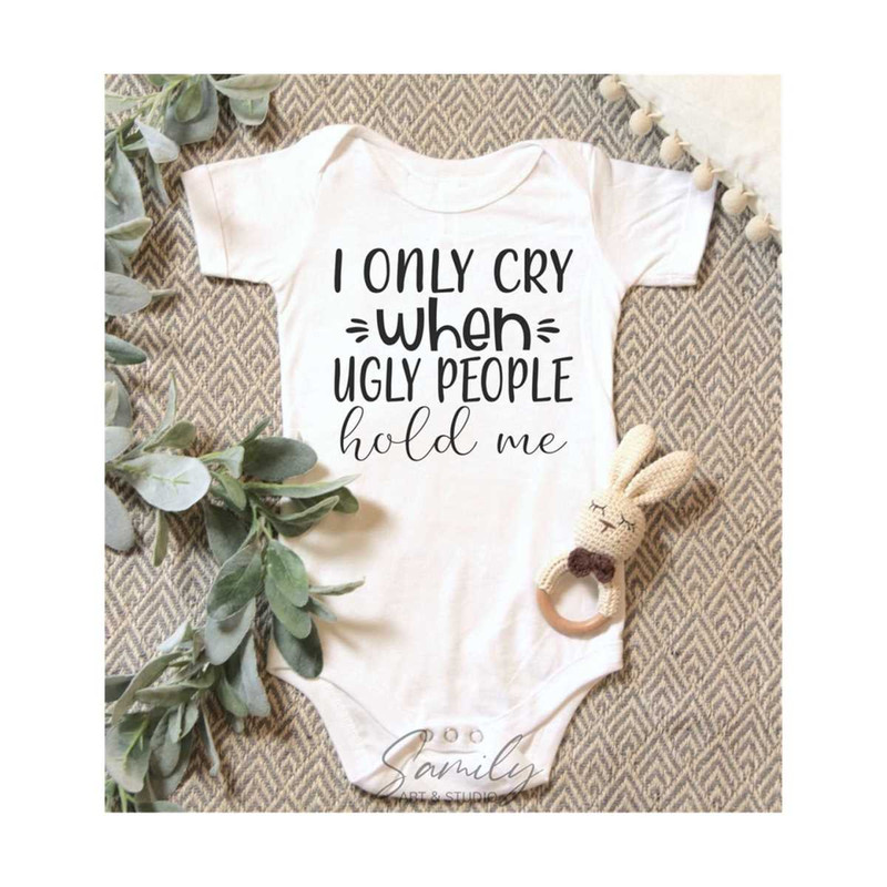 13112023182910-i-only-cry-when-ugly-people-hold-me-svg-baby-onesie-image-1.jpg