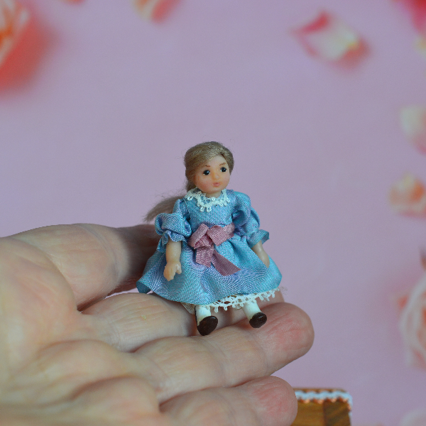 Tiny- doll- with -accessories- in- a- wooden- casket-  at- a- scale- of -1:24-8