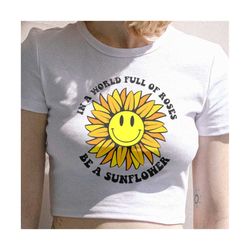 in a world full of roses be a sunflower svg