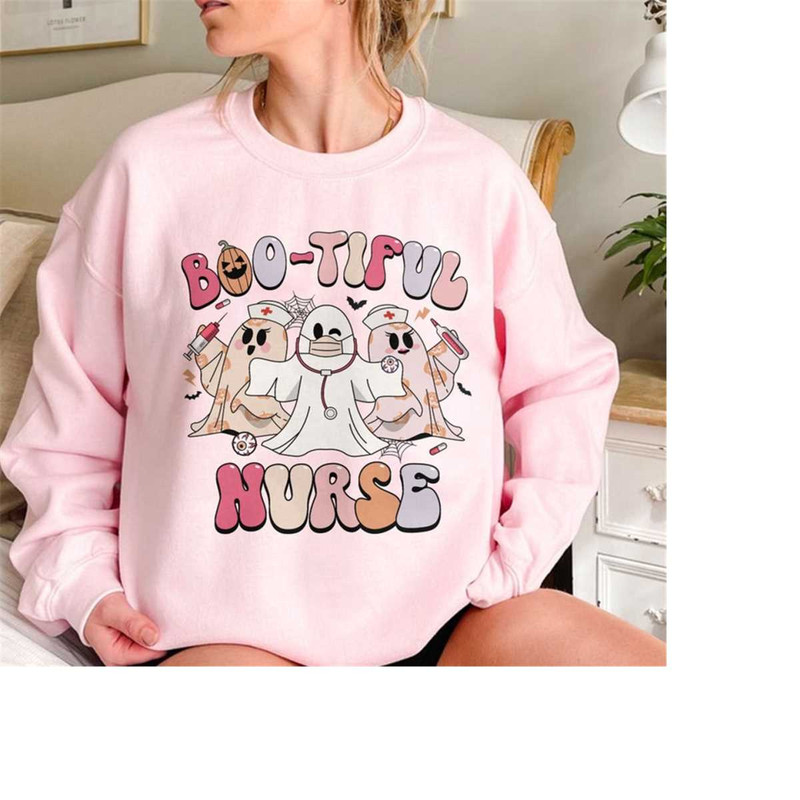 MR-15112023135227-halloween-nurse-sweatshirt-booboo-crew-crewneck-halloween-rn-image-1.jpg