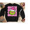 MR-1611202316428-pink-grinch-face-preppy-sweatshirt-womens-christmas-image-1.jpg