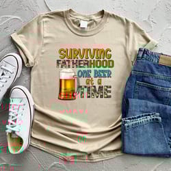 surviving fatherhood one beer at a time shirt cool and trendy dad shirt with a humorous twist on fatherhood funny dad sh