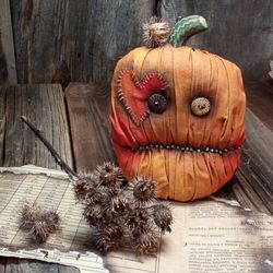 Tall pumpkin with a heart