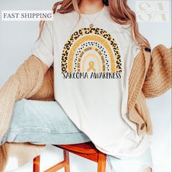 in july we wear yellow shirt for sarcoma awareness, sarcoma awareness yellow ribbon shirt, sarcoma cancer support tee ca