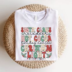christmas women shirts, cute retro xmas quote t-shirt, hot cocoa christmas lights shirt, gift for xmas holiday, 2023 hol