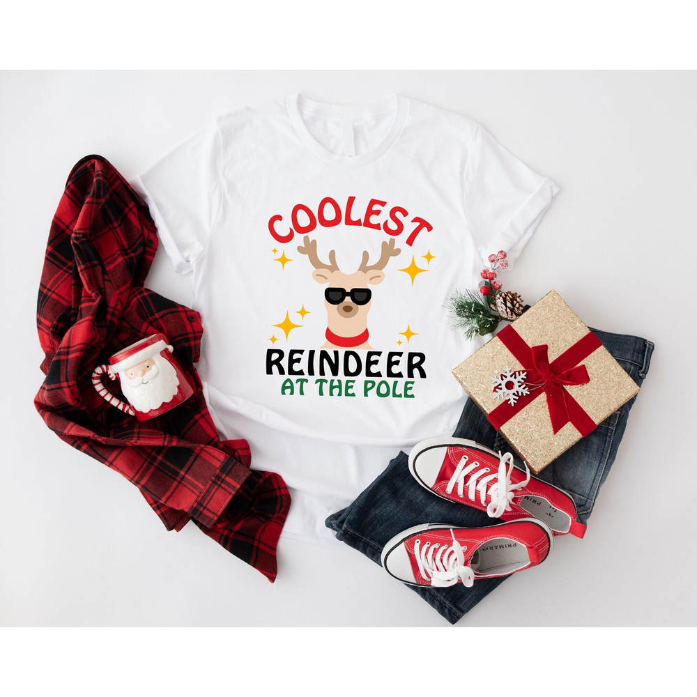 Coolest Reindeer At The Pole Shirt, North Pole Christmas Sweatshirt, Christmas Hunter Gifts, Christmas Reindeer Hoodie, Unisex Kids T-shirt.jpg