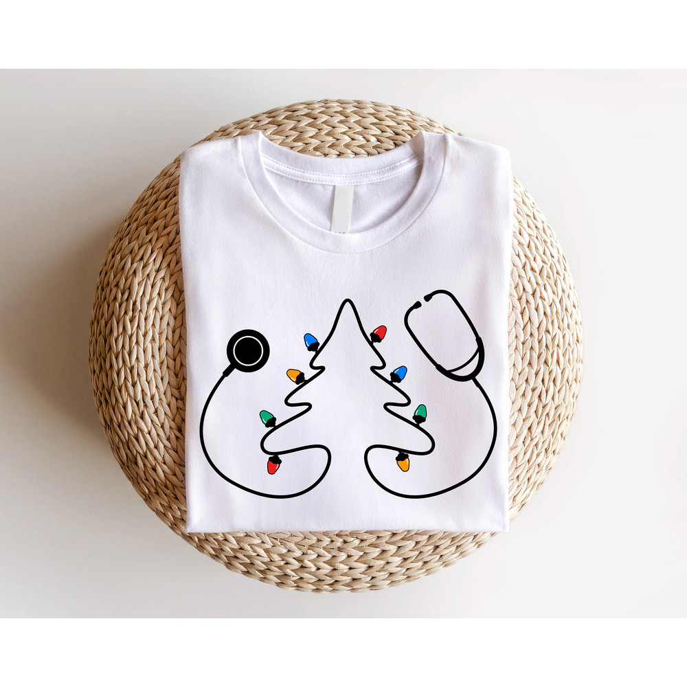 Nurse Stethoscope Christmas Shirt, Christmas Gift For Nurses, Stethoscope Christmas Tree With Lights Sweatshirt, Medical Christmas T-Shirts.jpg