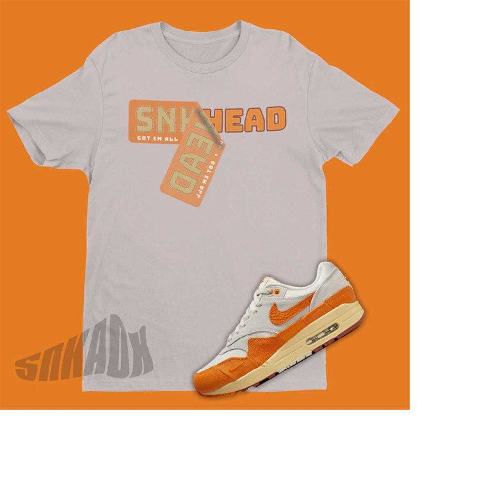 MR-21112023181623-sneaker-stickers-shirt-to-match-magma-orange-air-max-1s-image-1.jpg