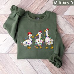 duck christmas sweatshirt, christmas ducks shirt, christmas lights, christmas crewneck, christmas gifts, funny christmas