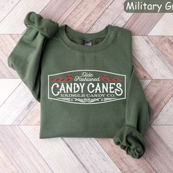 retro christmas sweatshirt, kringle candy co shirt, christmas candy sweatshirt, candy cane shirt, christmas crewneck swe