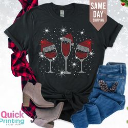 christmas wine glasses  tshirt, wine glasses santa hat christmas tee, crystal print ladies xmas tshirt, red wine glass s